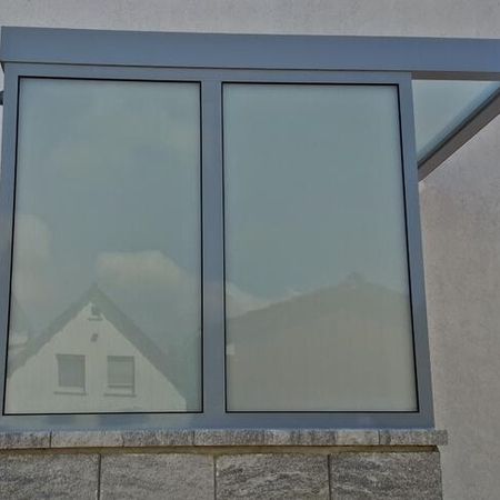 Überdachung mit Eindeckung aus Glas