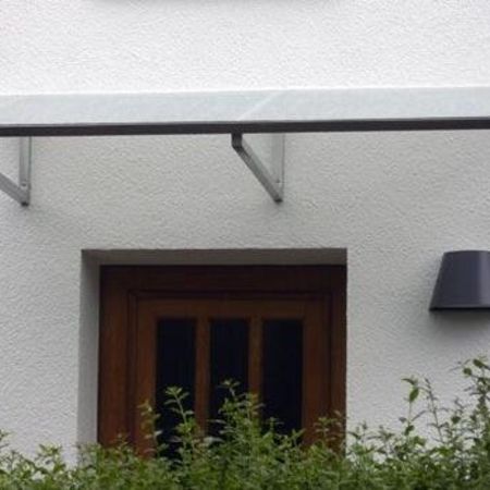 Überdachung mit Eindeckung aus Glas